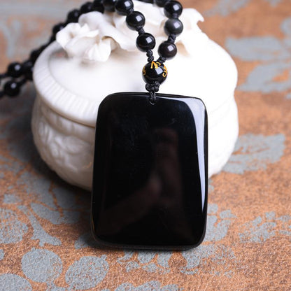 BLACK OBSIDIAN BUDDHA FACE NECKLACE